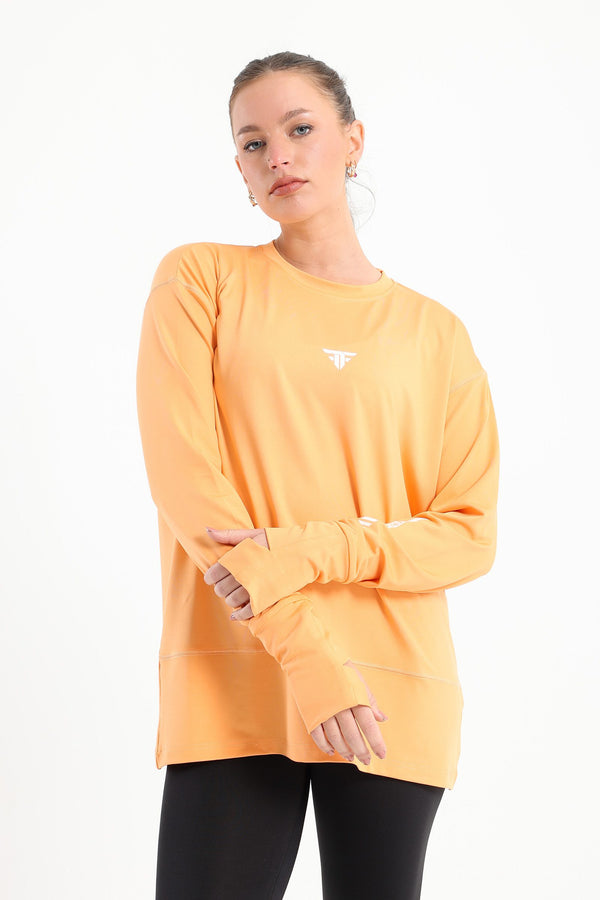 Apricot warm-up modest top